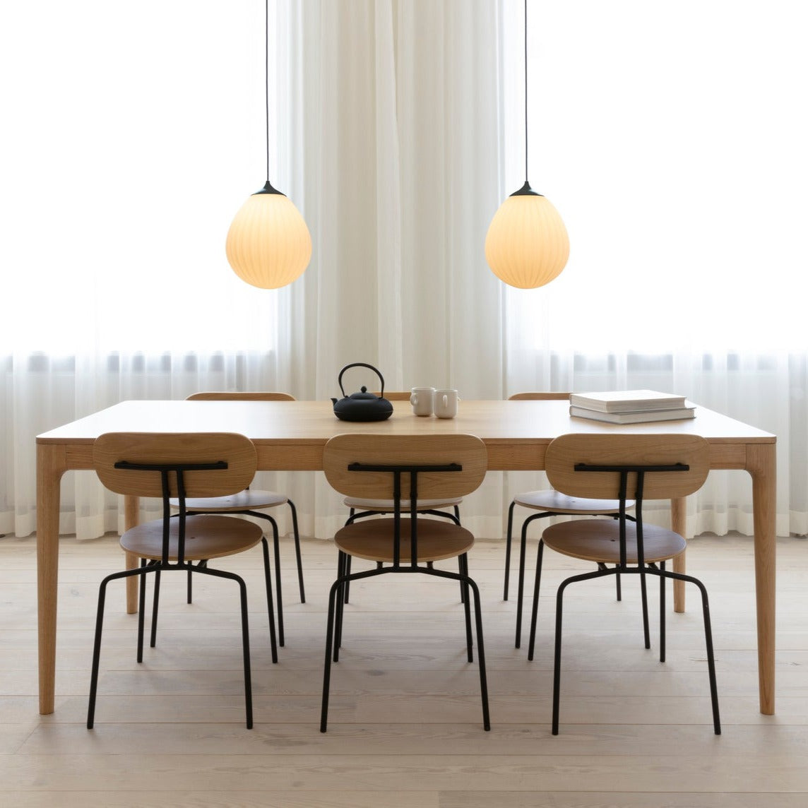 Light oak and black dining sales table